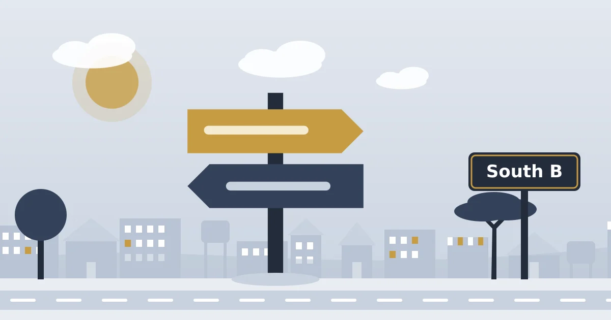 A signpost pointing the way, beside a sign for South B