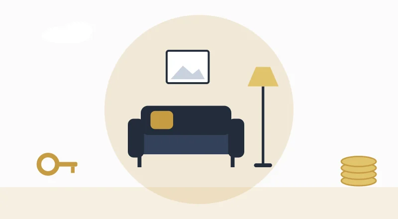 A cosy living room with a sofa and a lamp