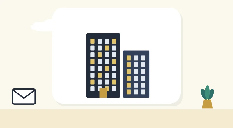 Two apartment blocks with lit windows