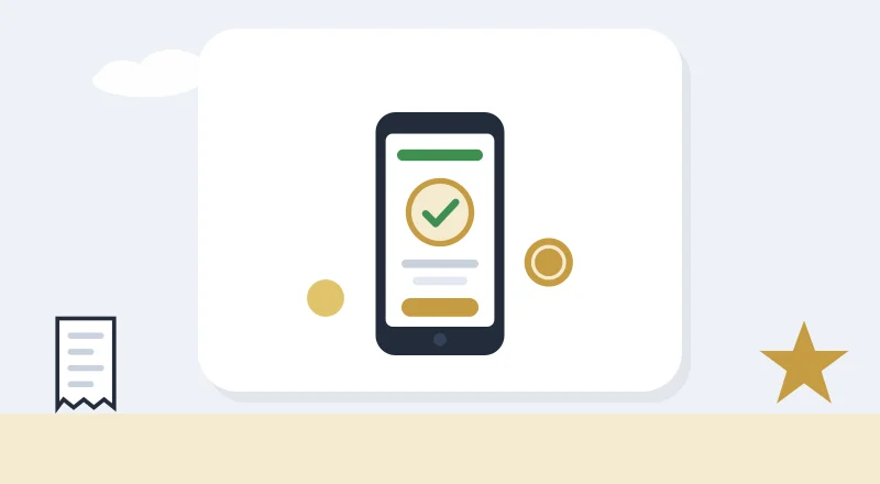 A phone showing a paid M-Pesa receipt, with coins