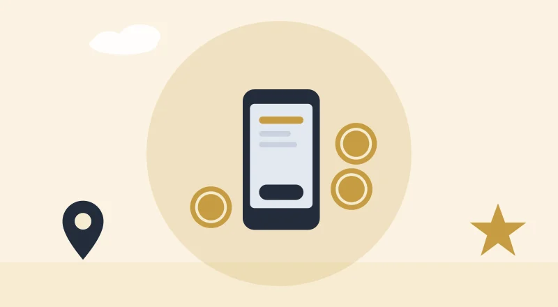 A phone with M-Pesa coins