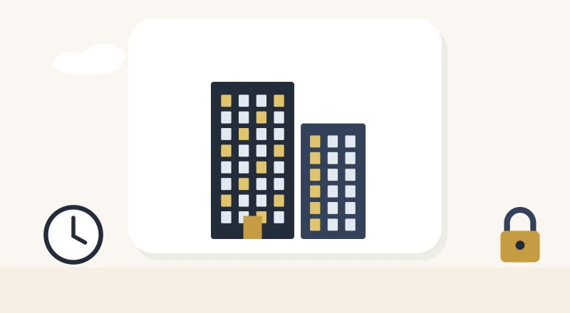 Two apartment blocks with lit windows