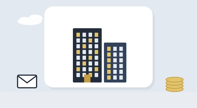 Two apartment blocks with lit windows