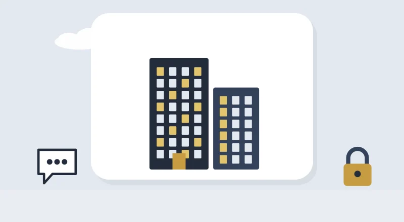 Two apartment blocks with lit windows