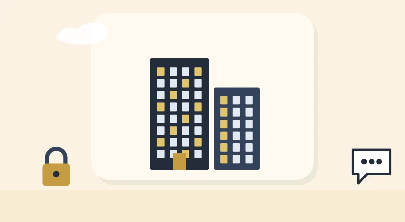 Two apartment blocks with lit windows