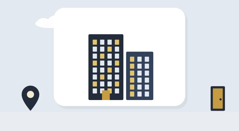 Two apartment blocks with lit windows