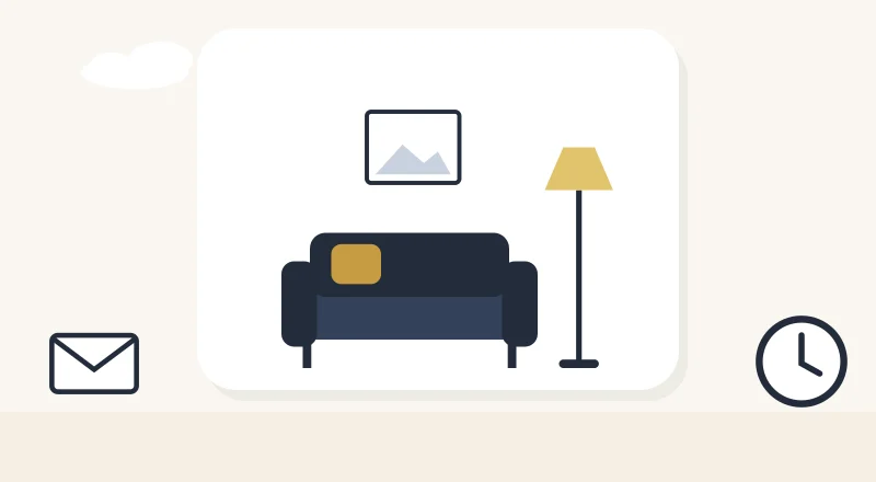 A cosy living room with a sofa and a lamp