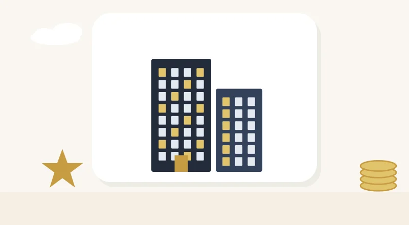 Two apartment blocks with lit windows