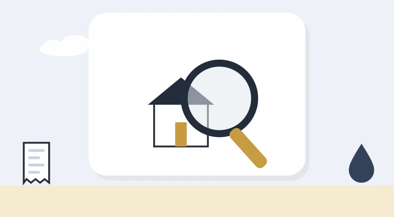 A magnifying glass over a house