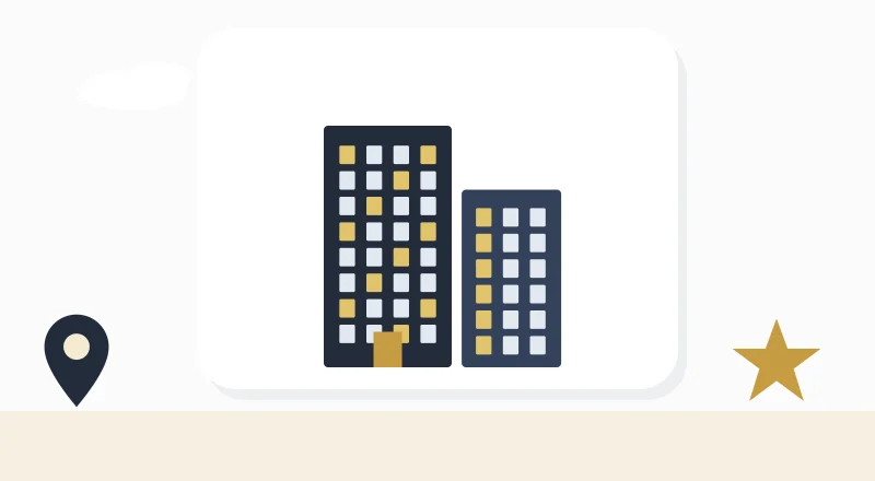Two apartment blocks with lit windows