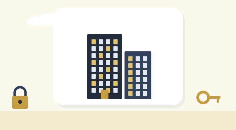 Two apartment blocks with lit windows