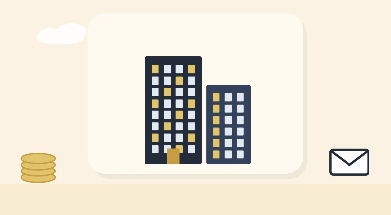 Two apartment blocks with lit windows