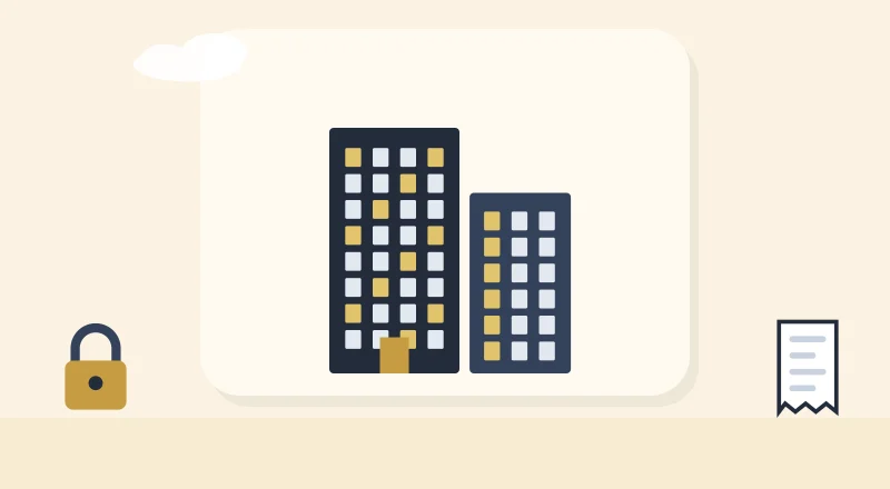 Two apartment blocks with lit windows