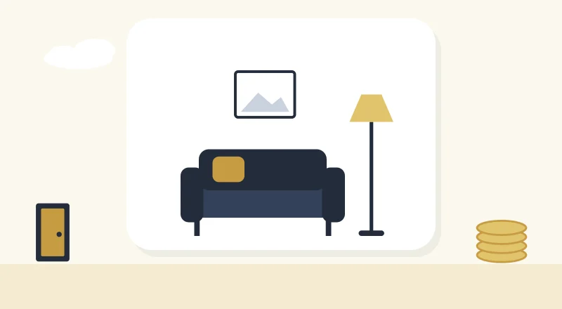 A cosy living room with a sofa and a lamp