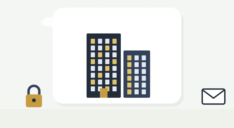 Two apartment blocks with lit windows