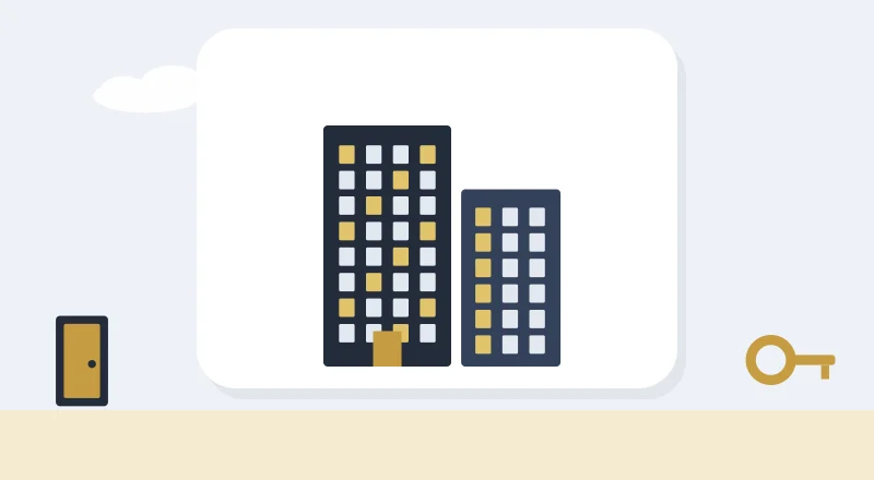Two apartment blocks with lit windows