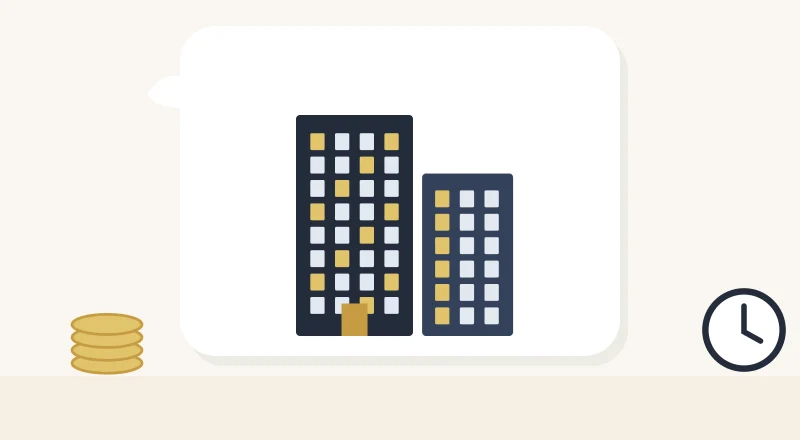 Two apartment blocks with lit windows
