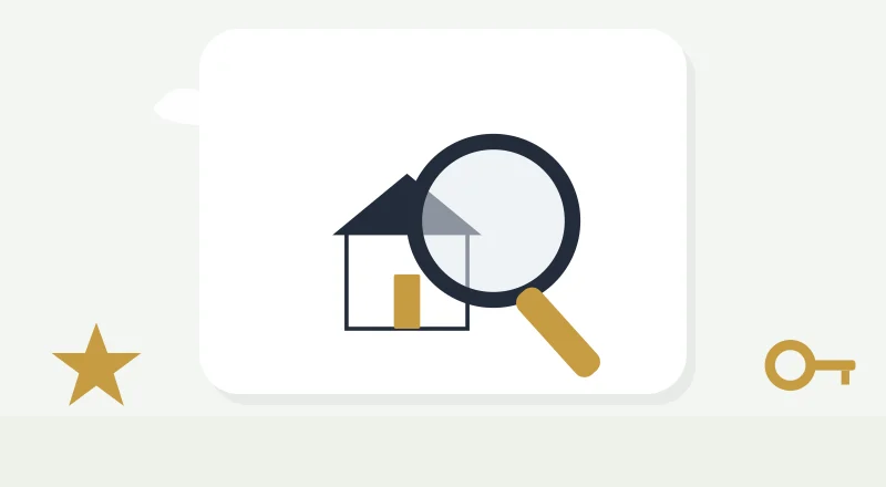 A magnifying glass over a house
