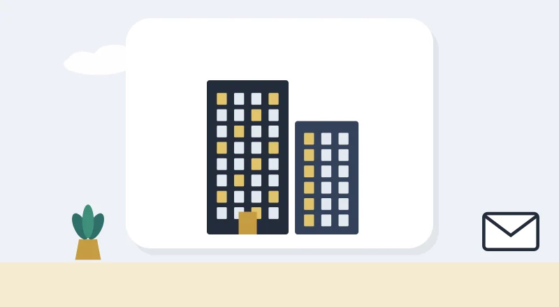 Two apartment blocks with lit windows
