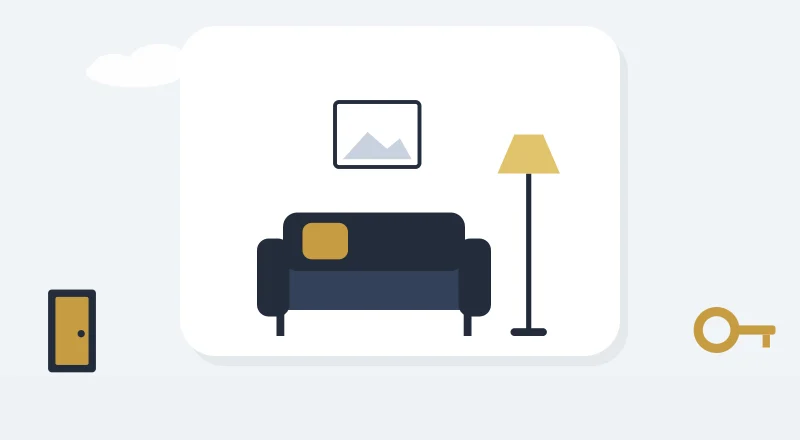 A cosy living room with a sofa and a lamp