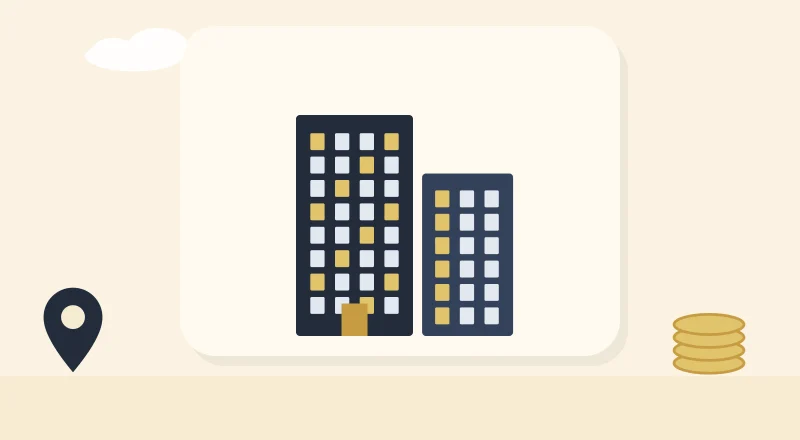 Two apartment blocks with lit windows