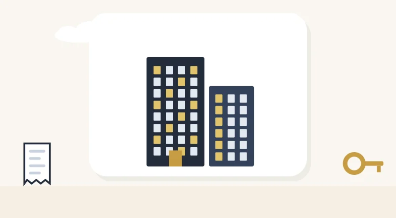 Two apartment blocks with lit windows