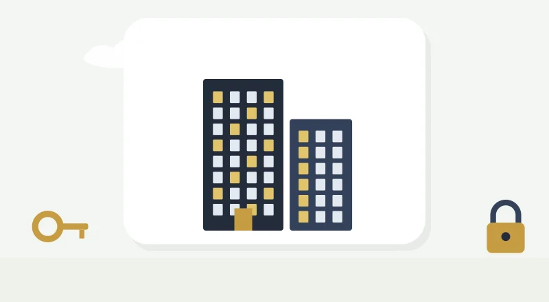Two apartment blocks with lit windows