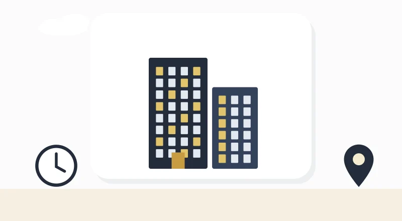 Two apartment blocks with lit windows