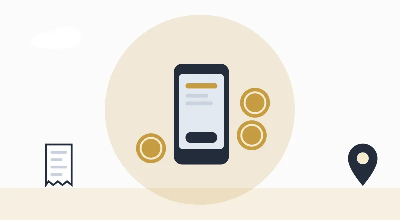 A phone with M-Pesa coins